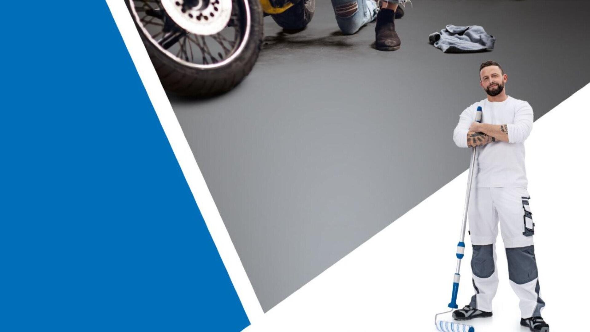 A man in white work clothes stands holding a mop on a clean white floor. In the background, a person sits on the ground near a motorcycle with a blue towel beside them. The image has blue and white geometric shapes.