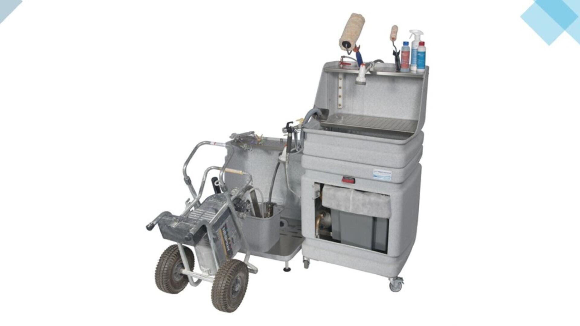 A portable cleaning station with a sink, storage compartments, cleaning supplies, and a wheeled pressure washer on the left side against a white background.